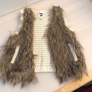 White, furry vest